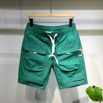 Летние новые шорты 2023, мужская мода, Универсальные повседневные брюки среднего размера, свободные мужские капри с большим карманом, рабочая мода